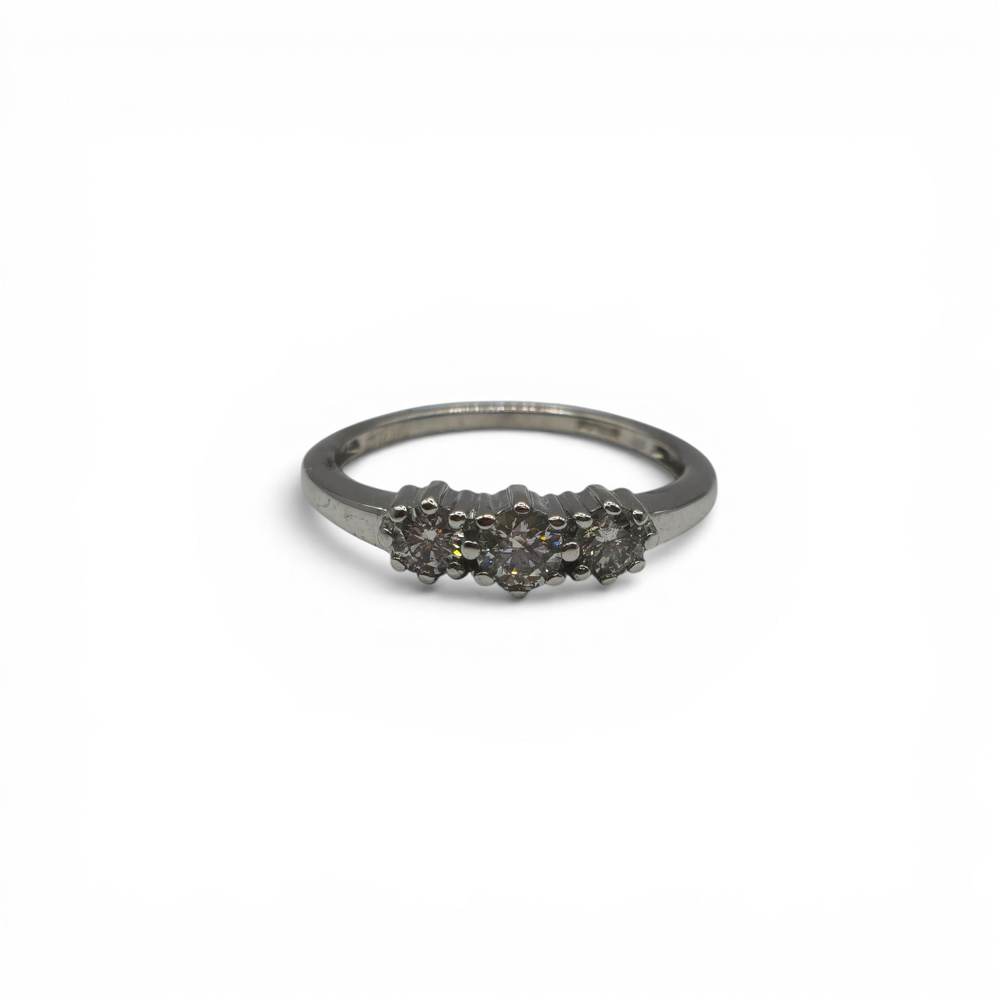 18ct white gold diamond ring by Reeves and Sons with sparkling diamonds, showcasing elegant jewelry design.