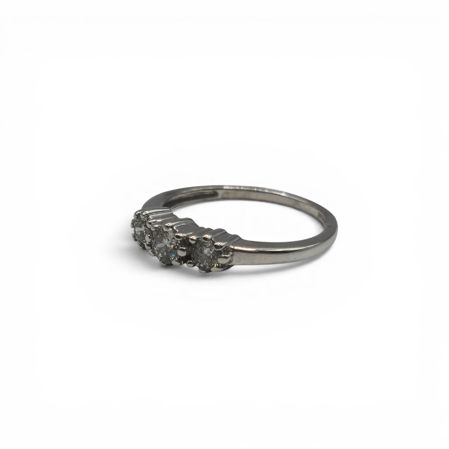 18ct white gold diamond ring by Reeves and Sons, featuring sparkling diamonds set in a elegant band.