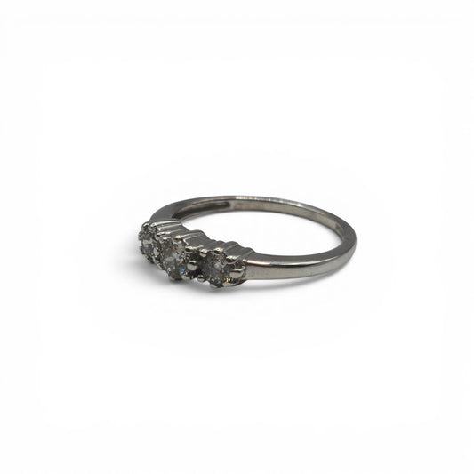 18ct white gold diamond ring by Reeves and Sons, featuring sparkling diamonds set in a elegant band.