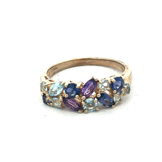 9ct yellow gold gemstone ring by Reeves and Sons with a detailed design and vibrant gemstone, displayed on a neutral background.