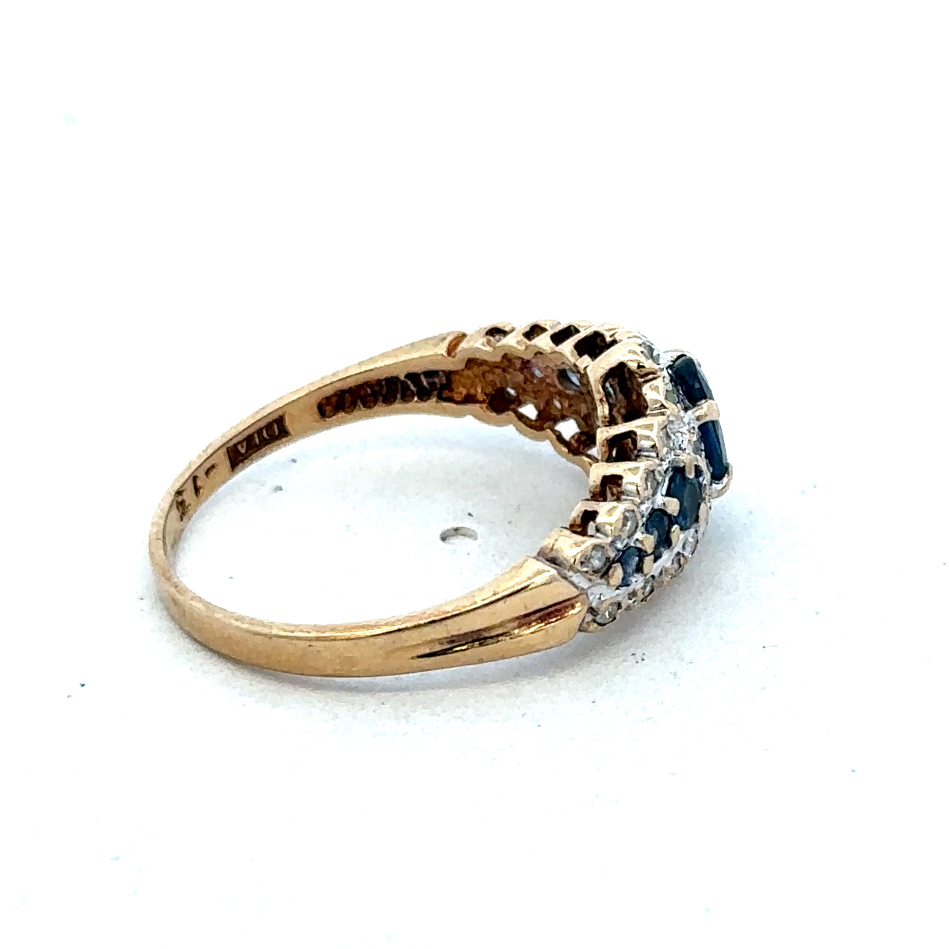 9ct yellow gold diamond ring by Reeves and Sons, featuring a sparkling diamond centerpiece and elegant band design.