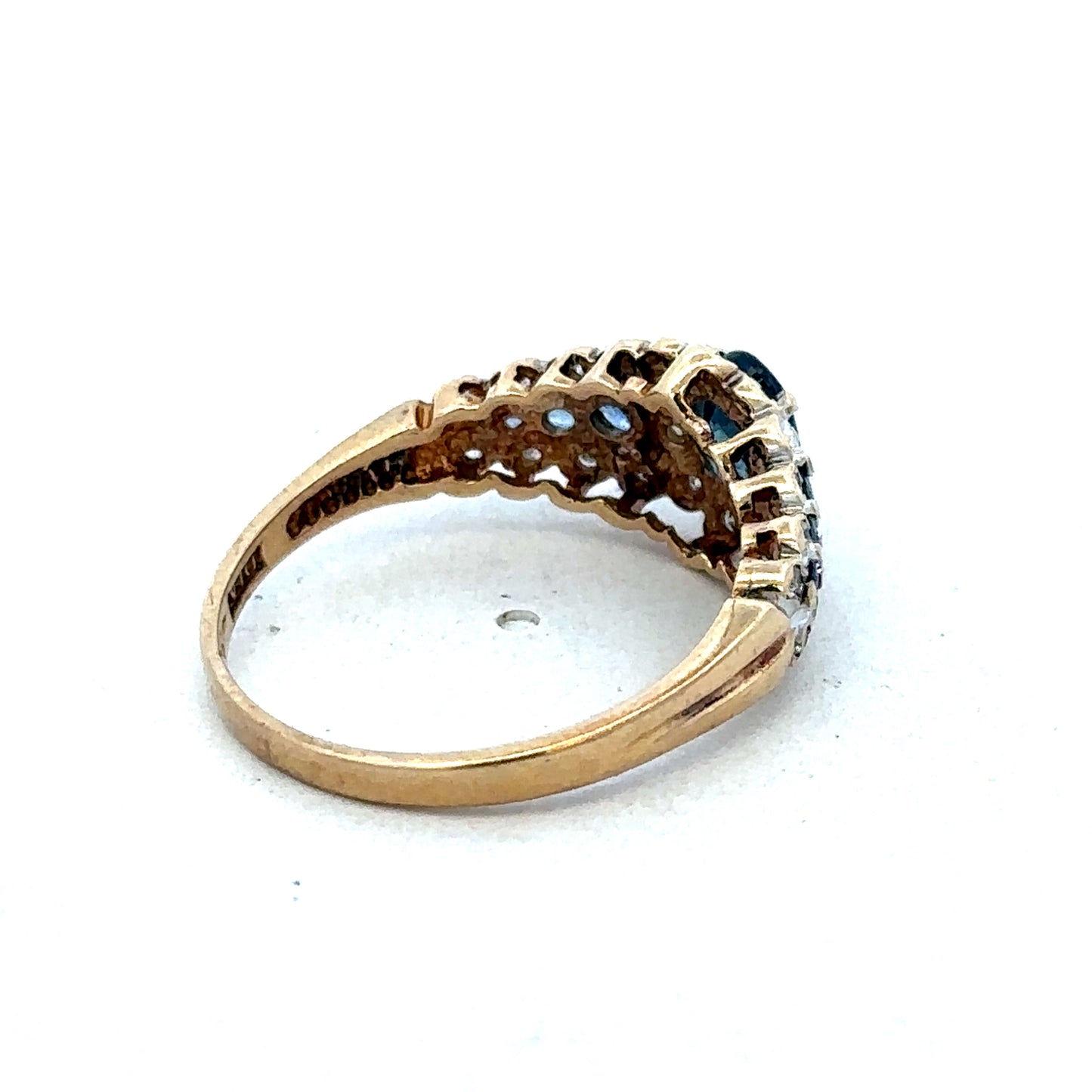 9ct yellow gold diamond ring by Reeves and Sons, featuring a sparkling diamond set in a polished gold band.