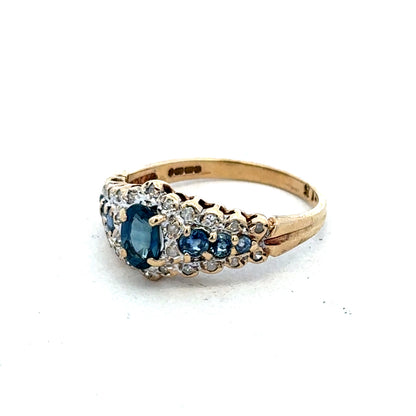 9ct yellow gold diamond ring by Reeves and Sons, featuring sparkling diamonds and a polished band, elegant jewelry accessory.