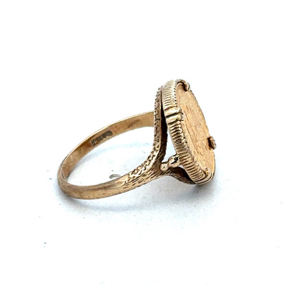 9ct gold Dos Pesos ring by Reeves and Sons featuring intricate design and a polished finish.