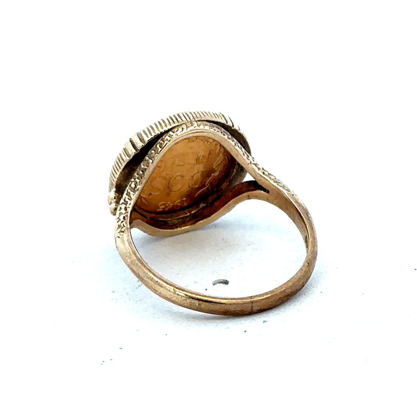 9ct gold Dos Pesos ring by Reeves and Sons, showcasing intricate design and polished finish in a close-up image.