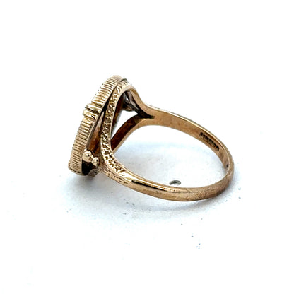 9ct gold Dos Pesos ring by Reeves and Sons, featuring intricate design and polished finish, displayed against a neutral background.