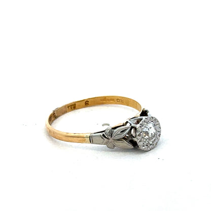 18ct yellow gold diamond ring by Reeves and Sons, showcasing sparkling diamonds and elegant design.