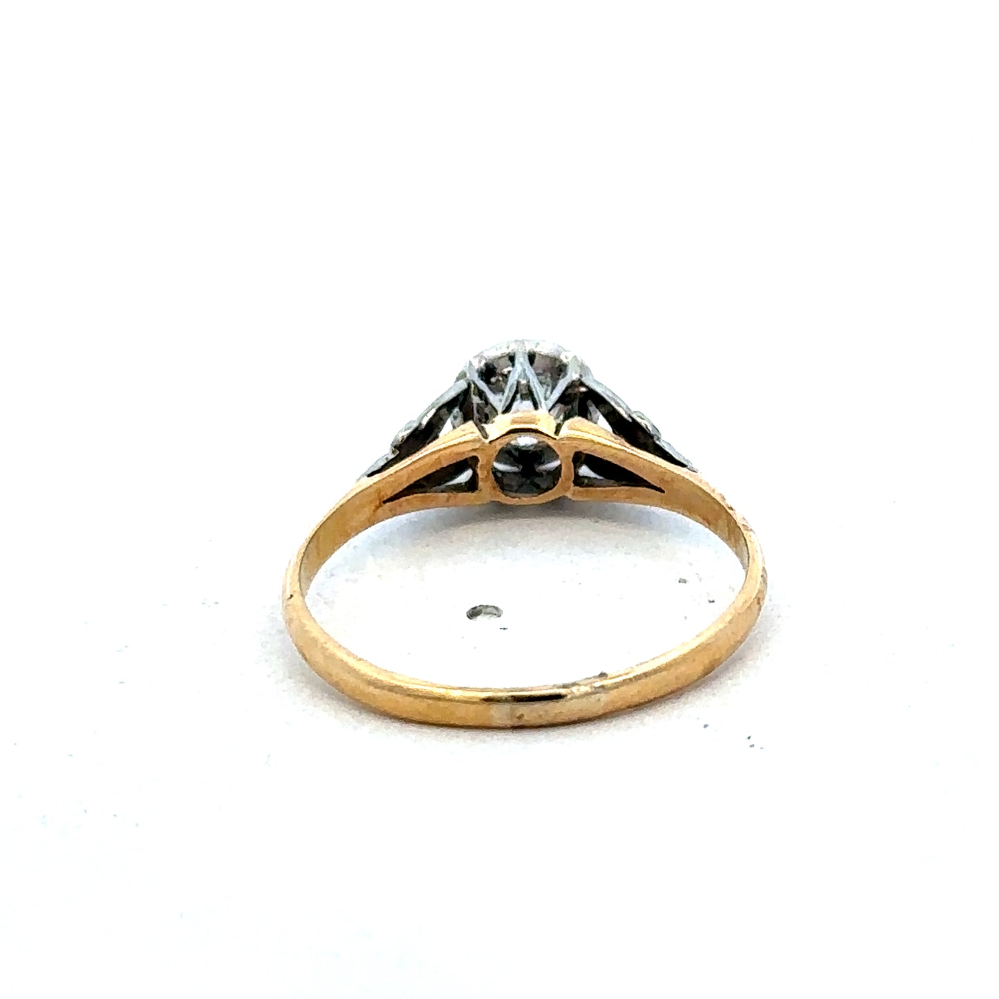 18ct yellow gold diamond ring by Reeves and Sons featuring sparkling diamonds and a classic elegant design.
