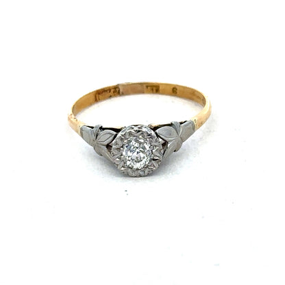 18ct yellow gold diamond ring by Reeves and Sons featuring sparkling diamonds and a sleek, elegant design.