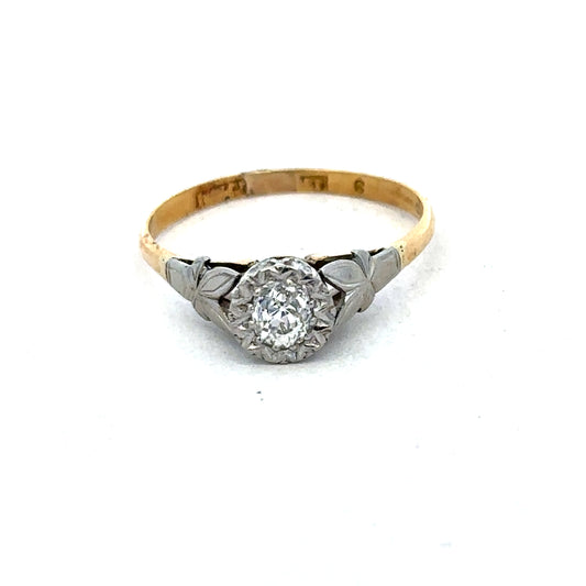 18ct yellow gold diamond ring by Reeves and Sons featuring sparkling diamonds and a sleek, elegant design.