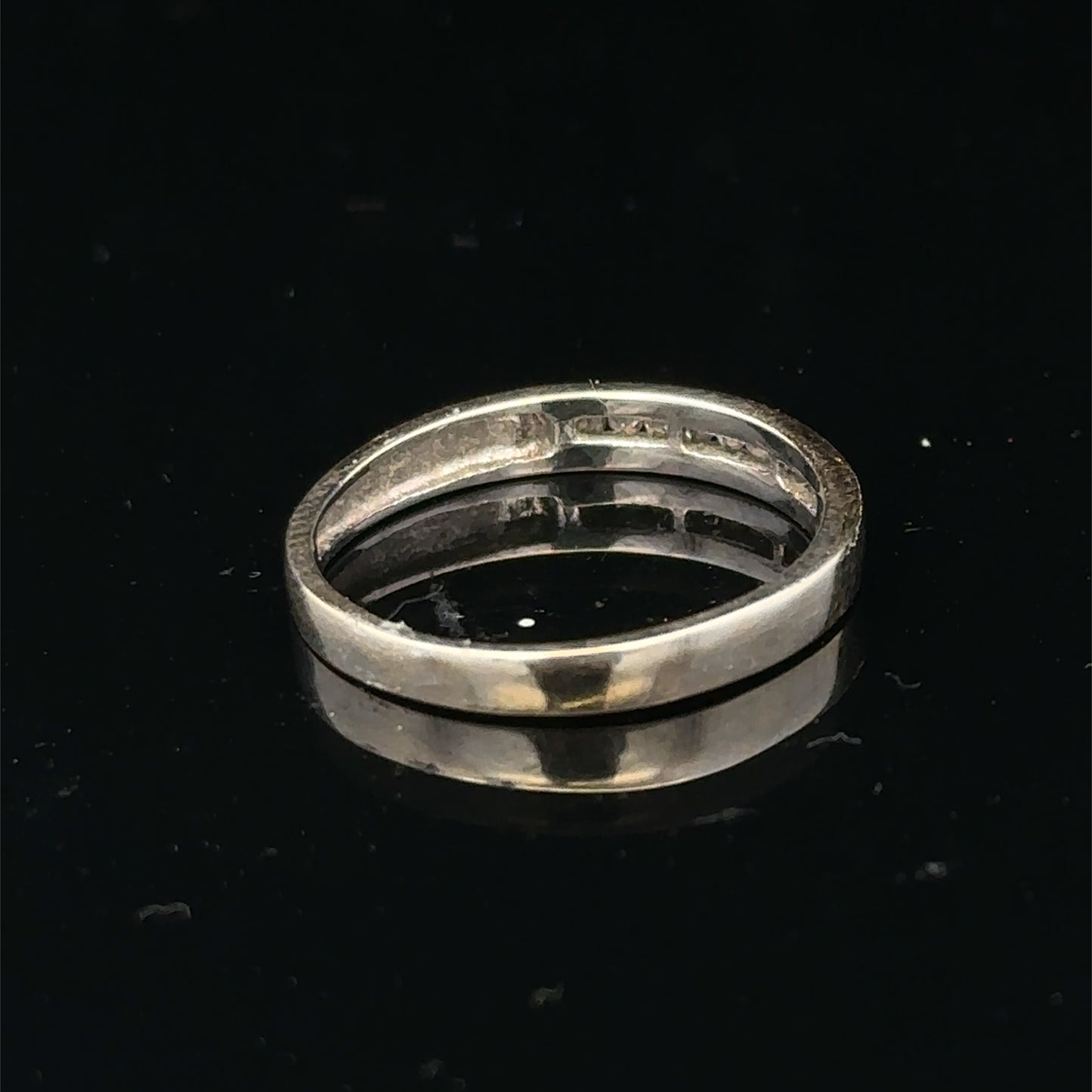 18ct white gold diamond half eternity ring with sparkling diamonds, crafted by Reeves and Sons.