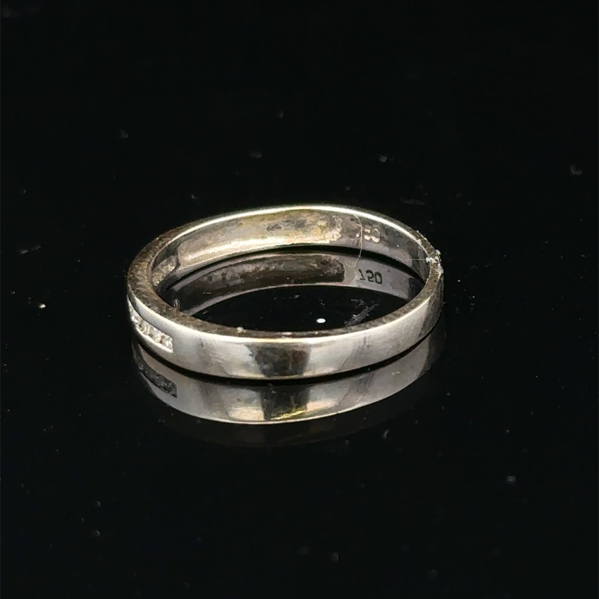 18ct white gold diamond half eternity ring by Reeves and Sons with sparkling diamonds around the band.