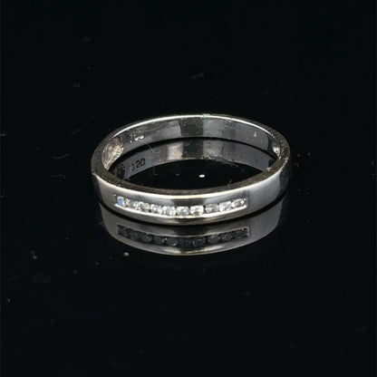 18ct white gold diamond half eternity ring featuring sparkling diamonds set in a sleek band by Reeves and Sons.