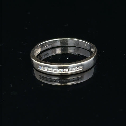 18ct white gold diamond half eternity ring featuring sparkling diamonds set in a sleek band by Reeves and Sons.