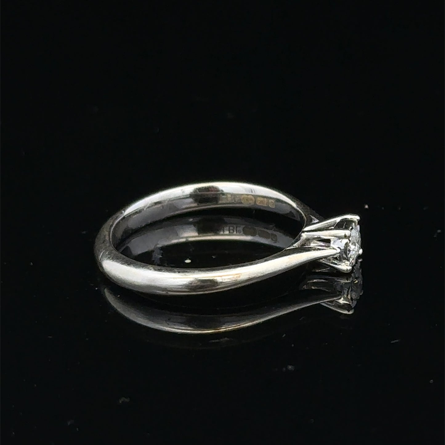 9ct white gold diamond solitaire ring featuring a single sparkling diamond, crafted by Reeves and Sons.