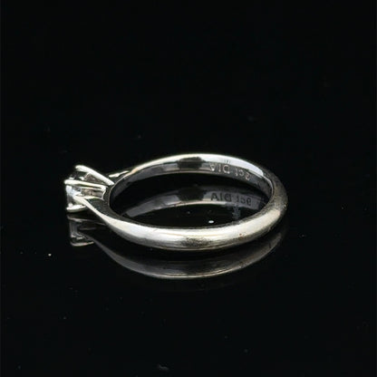9ct white gold diamond solitaire ring by Reeves and Sons, featuring a single sparkling diamond setting.