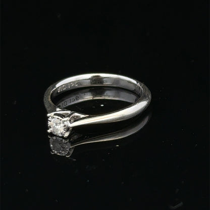 9ct white gold diamond solitaire ring by Reeves and Sons featuring a single sparkling diamond setting.