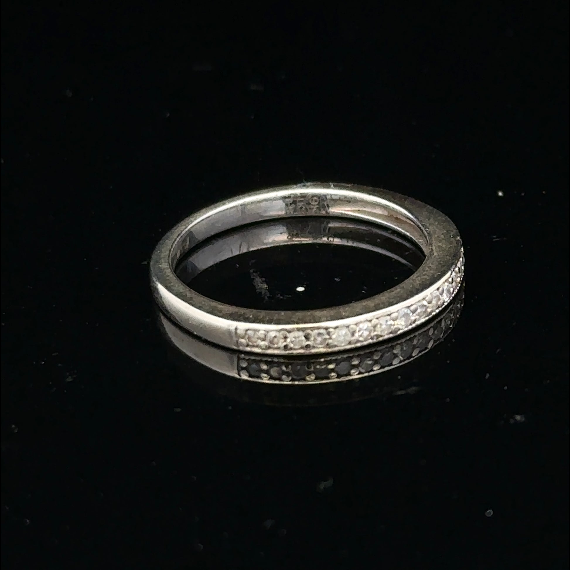 Reeves and Sons 9ct white gold diamond half eternity ring with sparkling diamonds set around the band.