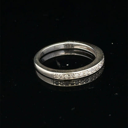 Reeves and Sons 9ct white gold diamond half eternity ring with sparkling diamonds set around the band.