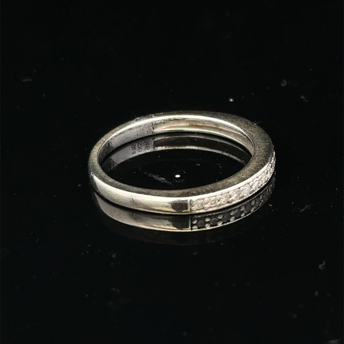 9ct white gold diamond half eternity ring with sparkling diamonds, showcasing Reeves and Sons craftsmanship.