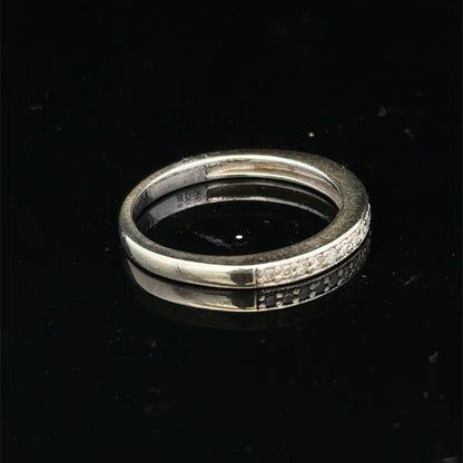 9ct white gold diamond half eternity ring with sparkling diamonds, showcasing Reeves and Sons craftsmanship.