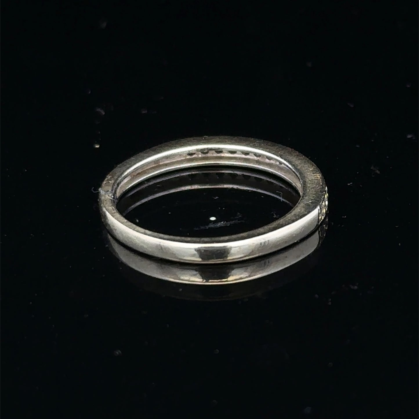 9ct white gold diamond half eternity ring with sparkling diamonds, crafted by Reeves and Sons, showcasing elegance and fine jewelry design.