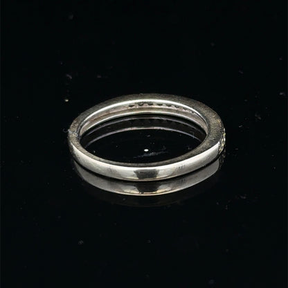 9ct white gold diamond half eternity ring with sparkling diamonds, crafted by Reeves and Sons, showcasing elegance and fine jewelry design.