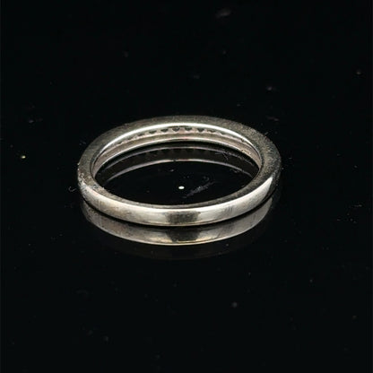 9ct white gold diamond half eternity ring with sparkling diamonds, showcasing Reeves and Sons craftsmanship.