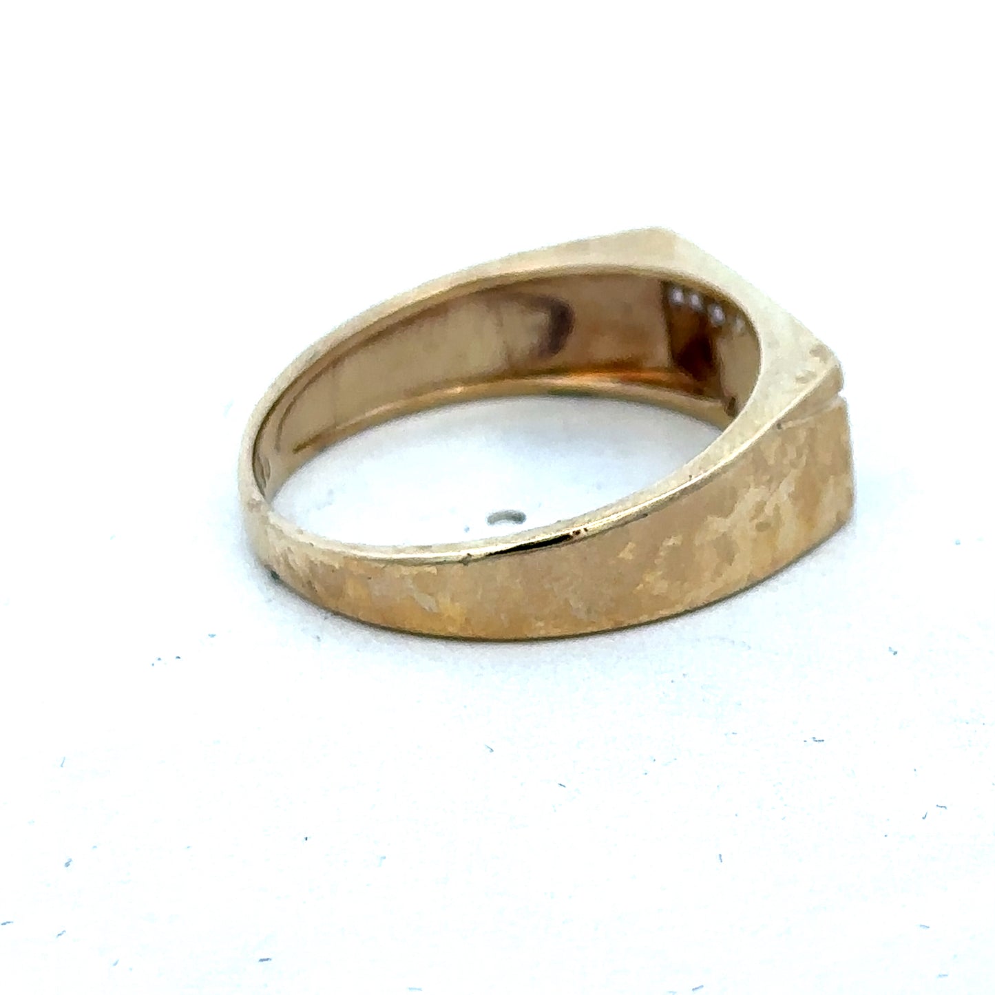 9ct yellow gold diamond ring with intricate design, size V, by Reeves and Sons, featuring sparkling diamonds.