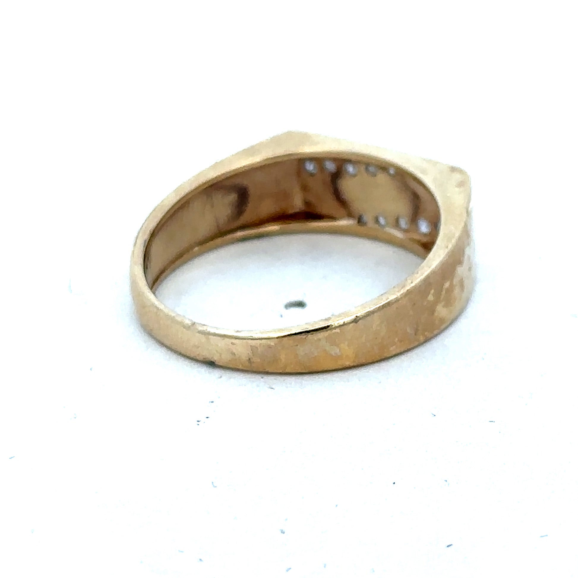 9ct yellow gold diamond ring in size V by Reeves and Sons, featuring a sparkling gemstone and elegant design.