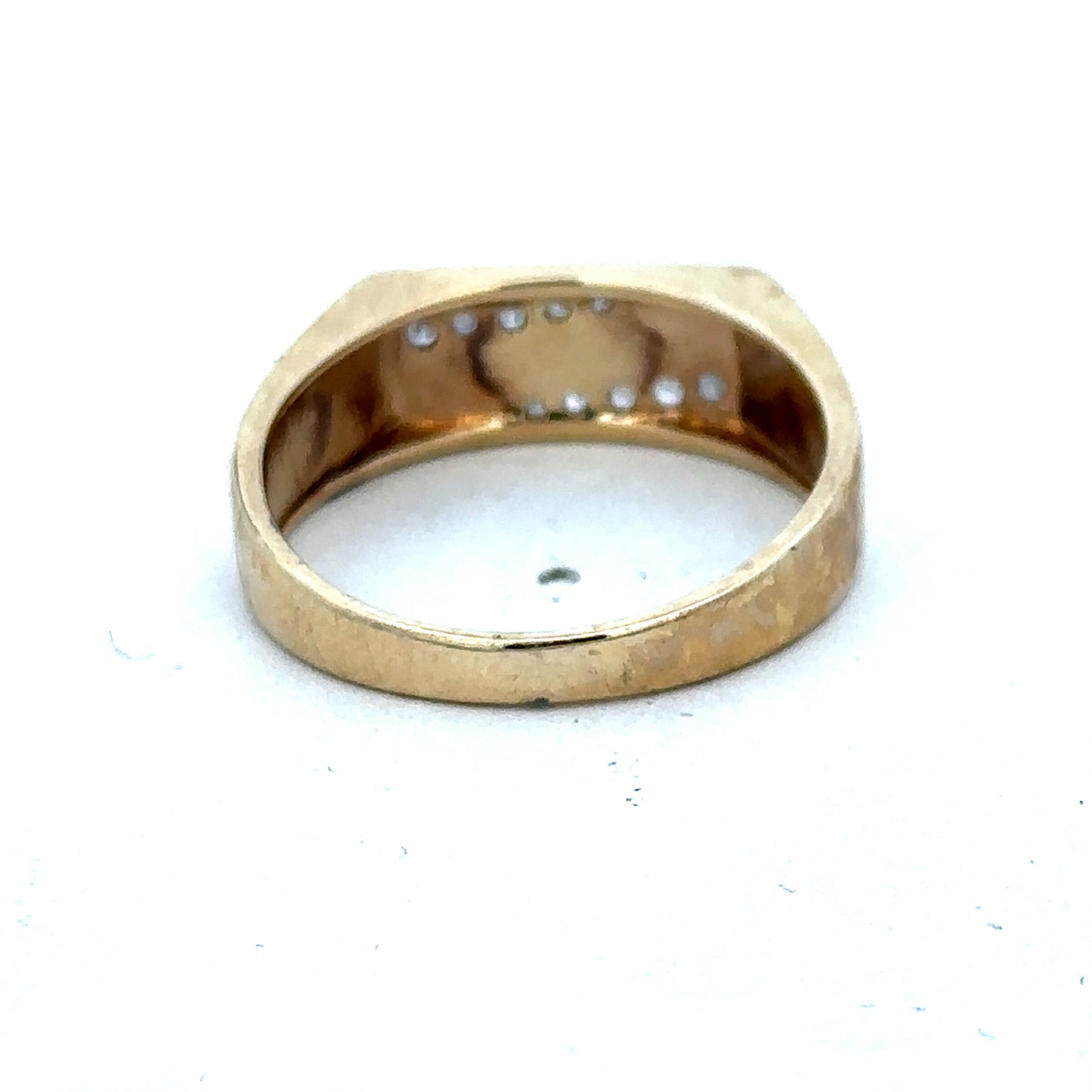 9ct yellow gold diamond ring in size V by Reeves and Sons, featuring a sparkling diamond setting.