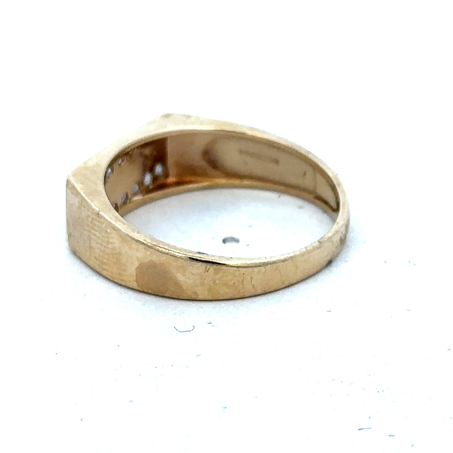 9ct yellow gold diamond ring in size V by Reeves and Sons, featuring a sparkling diamond and elegant design.