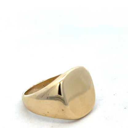 9ct yellow gold signet ring by Reeves and Sons, featuring a polished smooth surface and classic design.