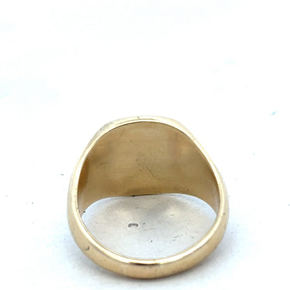 9ct yellow gold signet ring by Reeves and Sons, showcasing a smooth, polished surface and classic design.