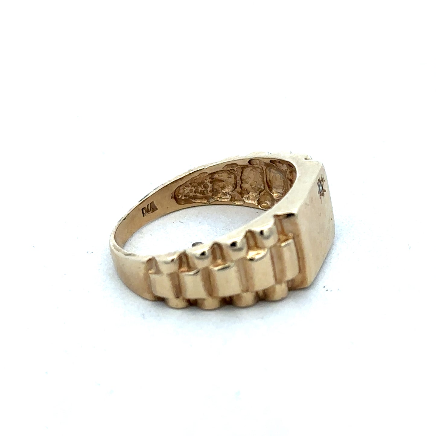 9ct yellow gold diamond ring by Reeves and Sons, showcasing a sparkling diamond set in a polished gold band.