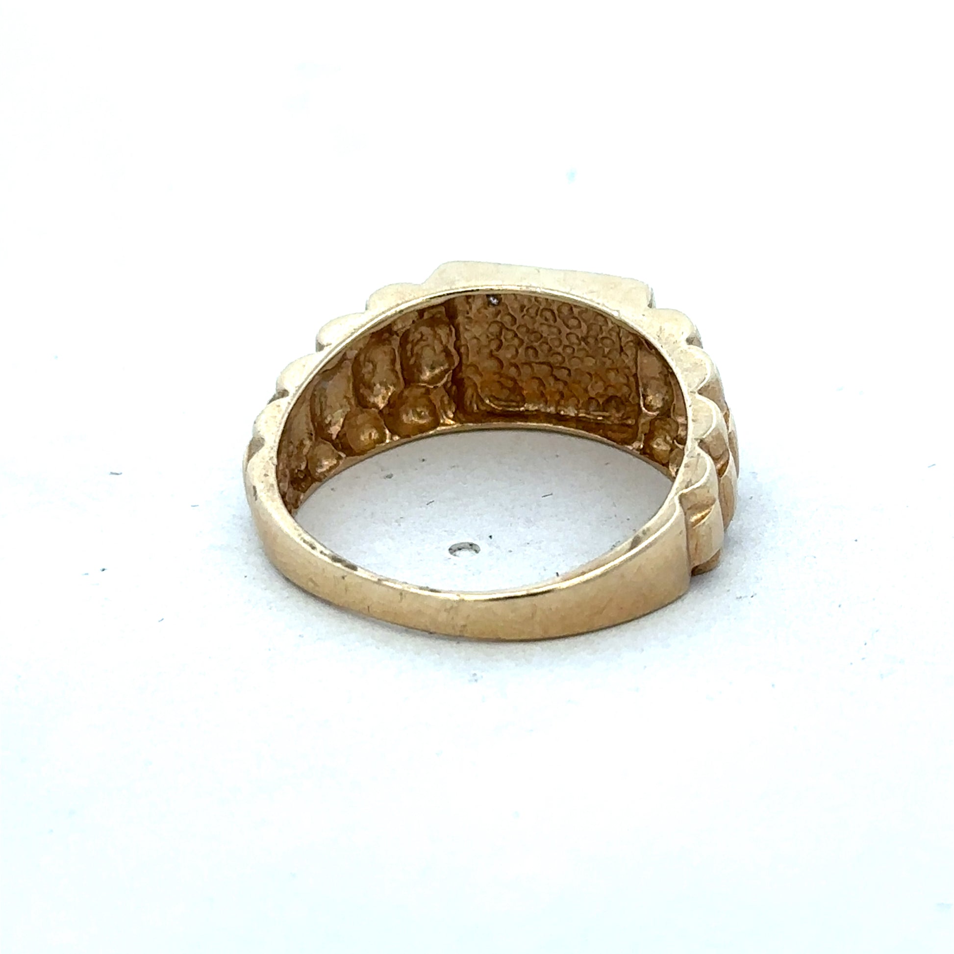 9ct yellow gold diamond ring by Reeves and Sons featuring a sparkling central diamond and elegant design.