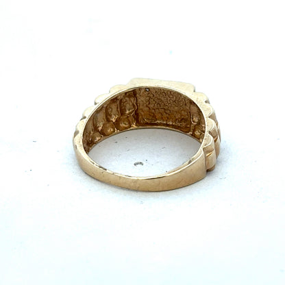 9ct yellow gold diamond ring by Reeves and Sons featuring a sparkling central diamond and elegant design.