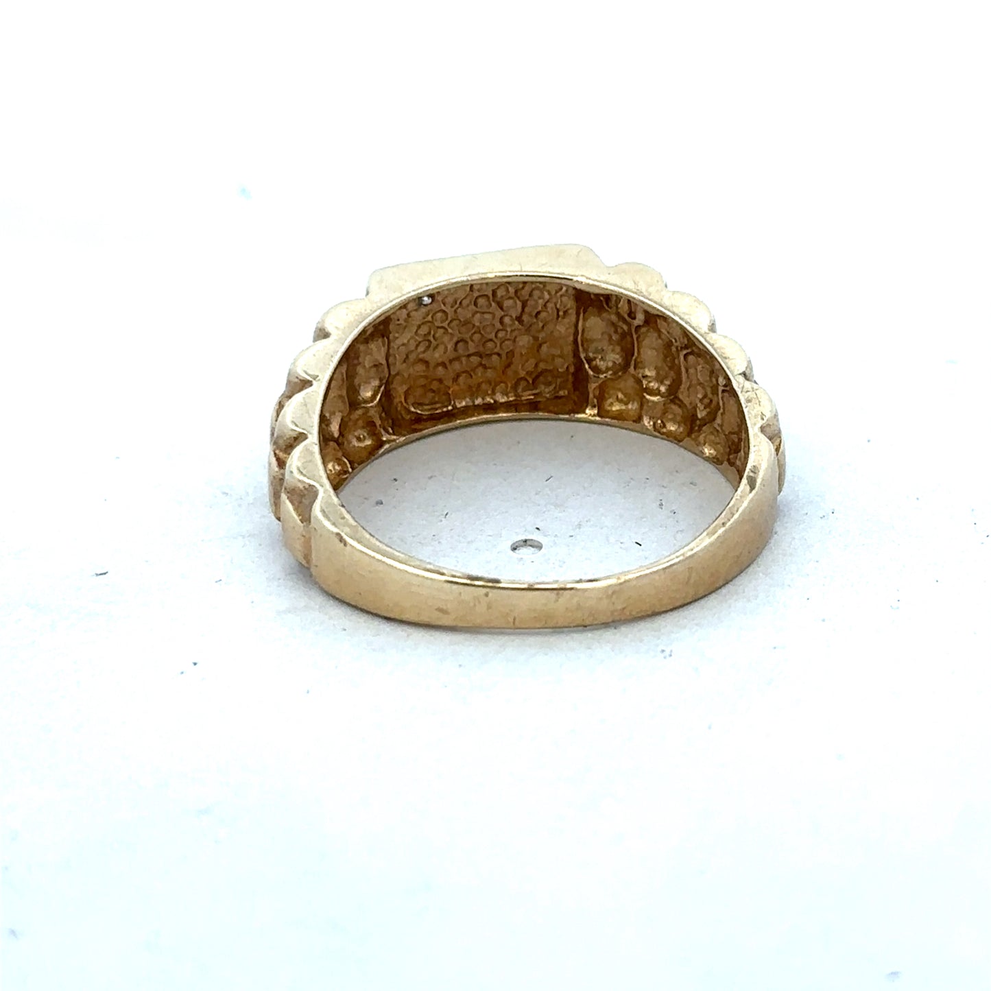 9ct yellow gold diamond ring by Reeves and Sons, featuring a sparkling diamond set in a classic band.