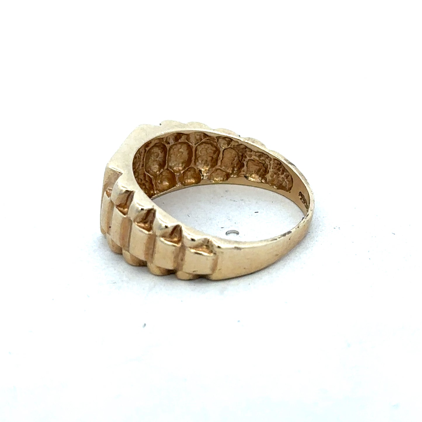 9ct yellow gold diamond ring by Reeves and Sons, featuring a sparkling diamond centerpiece and elegant design.