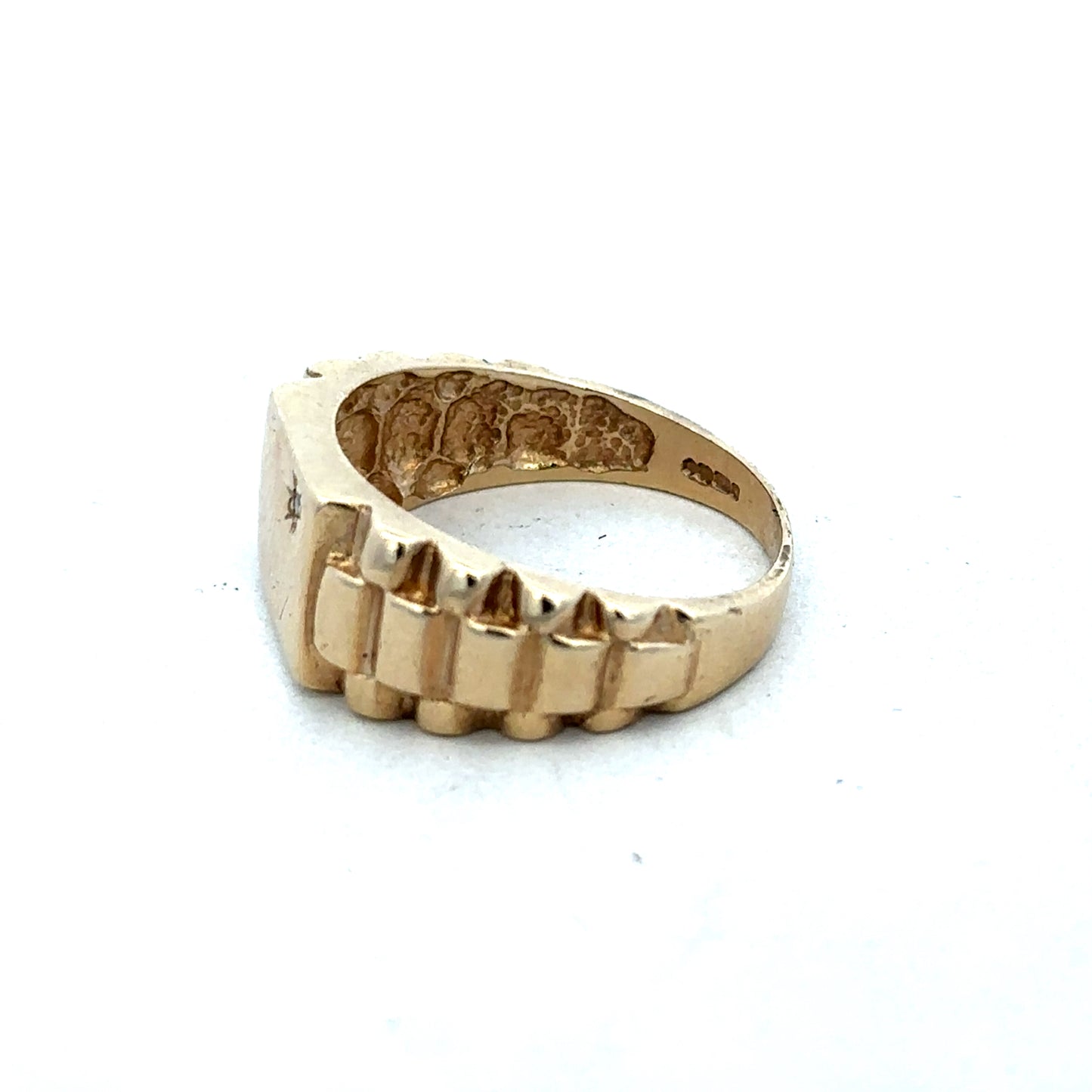 9ct yellow gold diamond ring by Reeves and Sons, featuring a sparkling diamond centerpiece and elegant design.