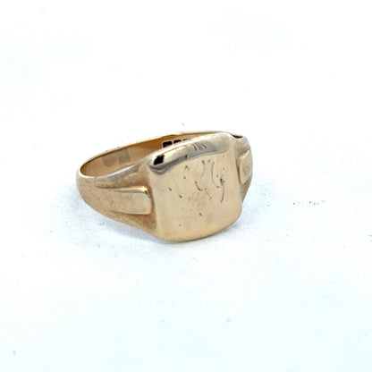 9ct yellow gold ring by Reeves and Sons, showcasing a polished band with subtle design details.