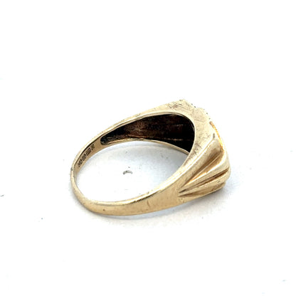 9ct yellow gold diamond ring by Reeves and Sons with sparkling diamonds and a polished band, elegant jewelry design.