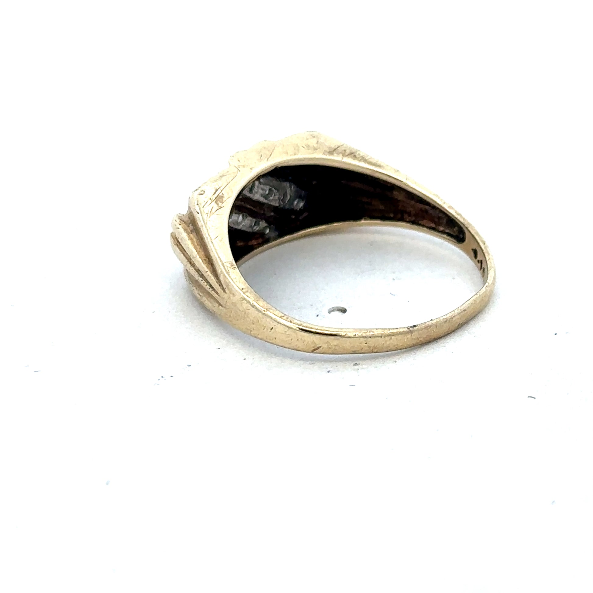 9ct yellow gold diamond ring by Reeves and Sons, featuring a sparkling diamond centerpiece and elegant design.