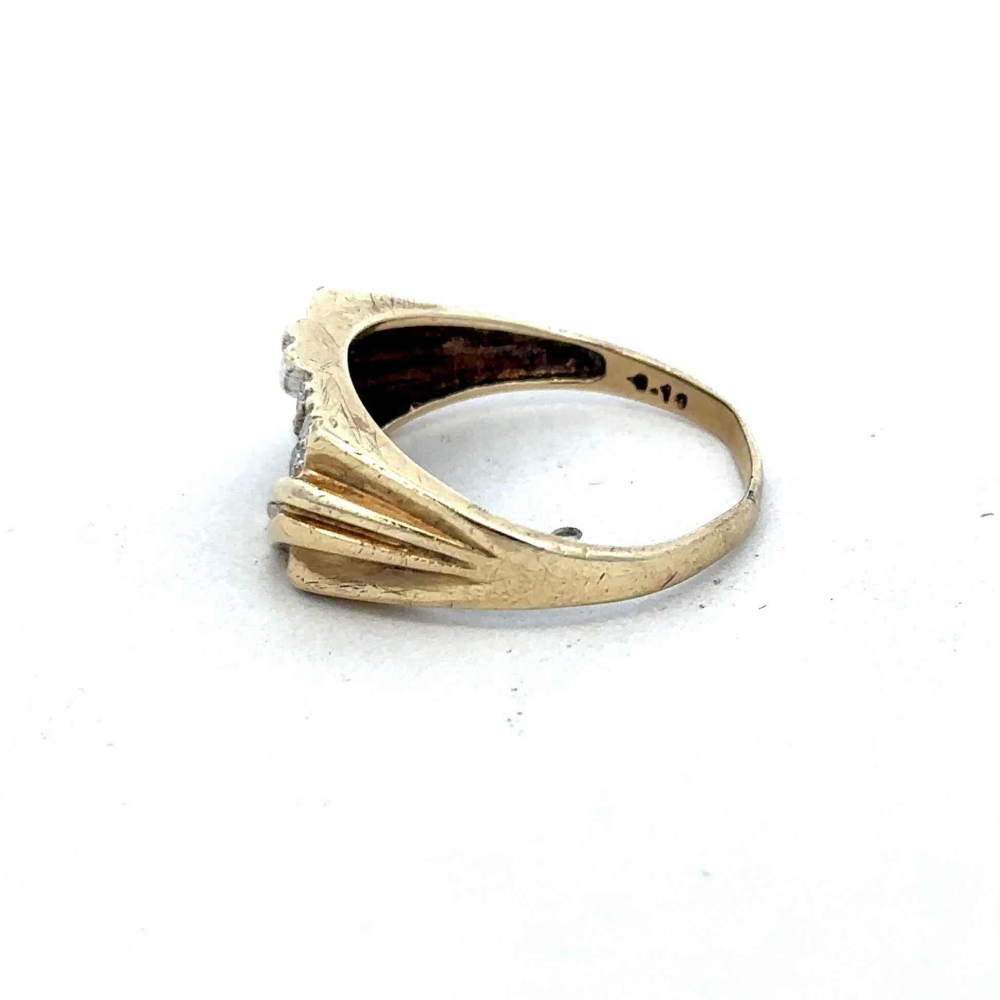 9ct yellow gold diamond ring by Reeves and Sons, featuring a sparkling diamond centerpiece and elegant design.