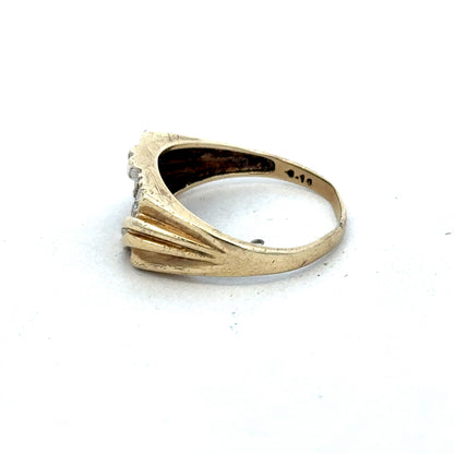 9ct yellow gold diamond ring by Reeves and Sons, featuring a sparkling diamond centerpiece and elegant design.