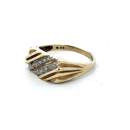 9ct yellow gold diamond ring by Reeves and Sons, featuring a sparkling diamond set in a polished gold band.