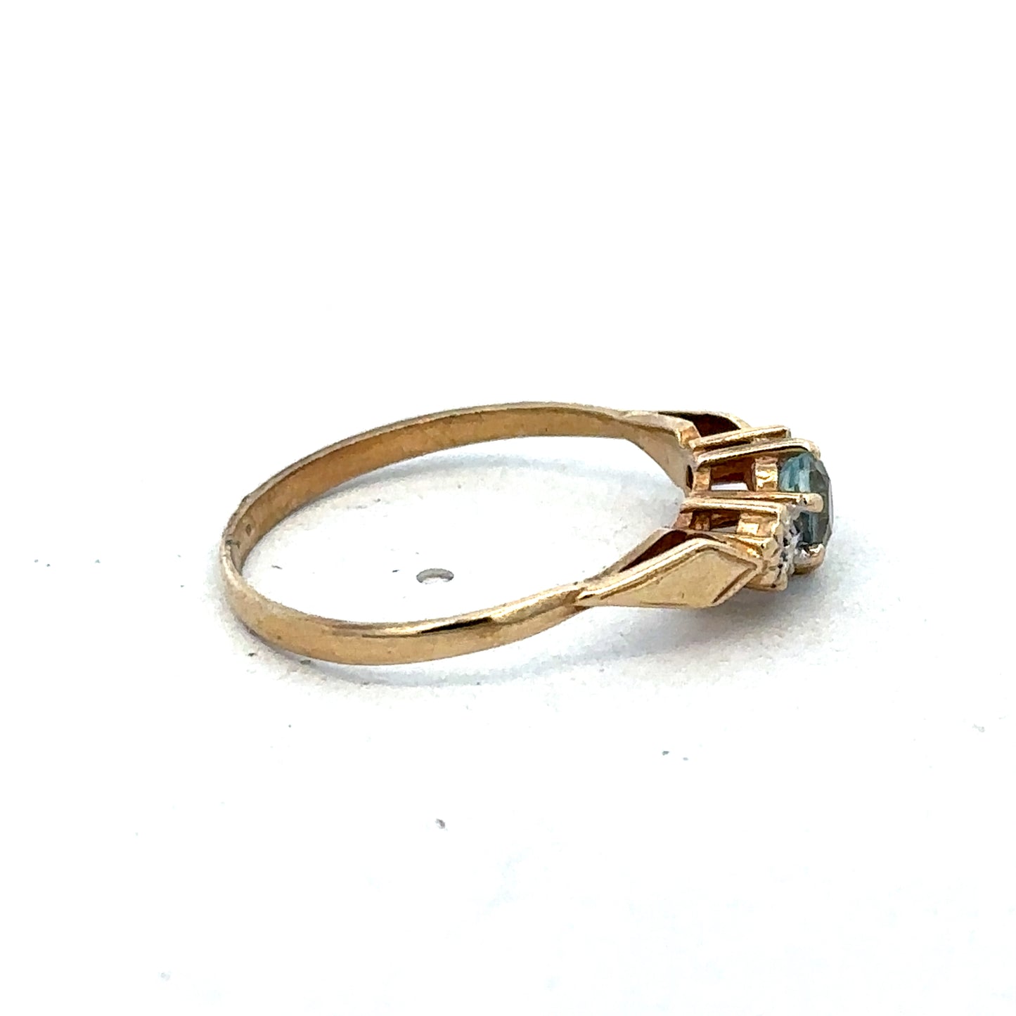 9ct yellow gold diamond ring by Reeves and Sons, featuring a sparkling diamond setting and elegant design.