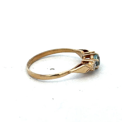 9ct yellow gold diamond ring by Reeves and Sons, featuring a sparkling diamond setting and elegant design.