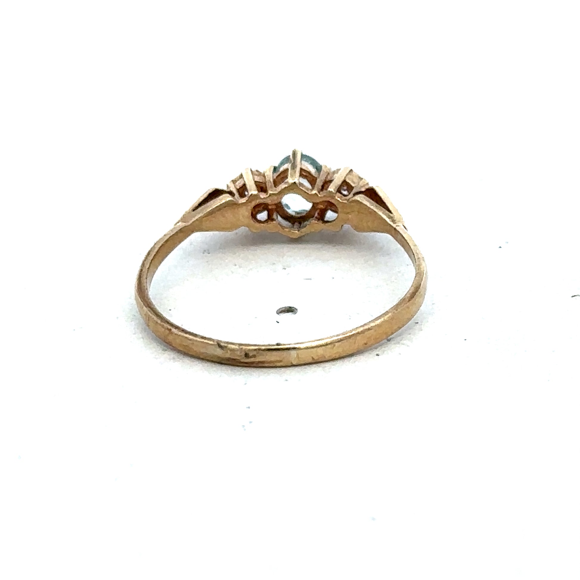 9ct yellow gold diamond ring by Reeves and Sons, featuring a sparkling diamond setting and elegant design.