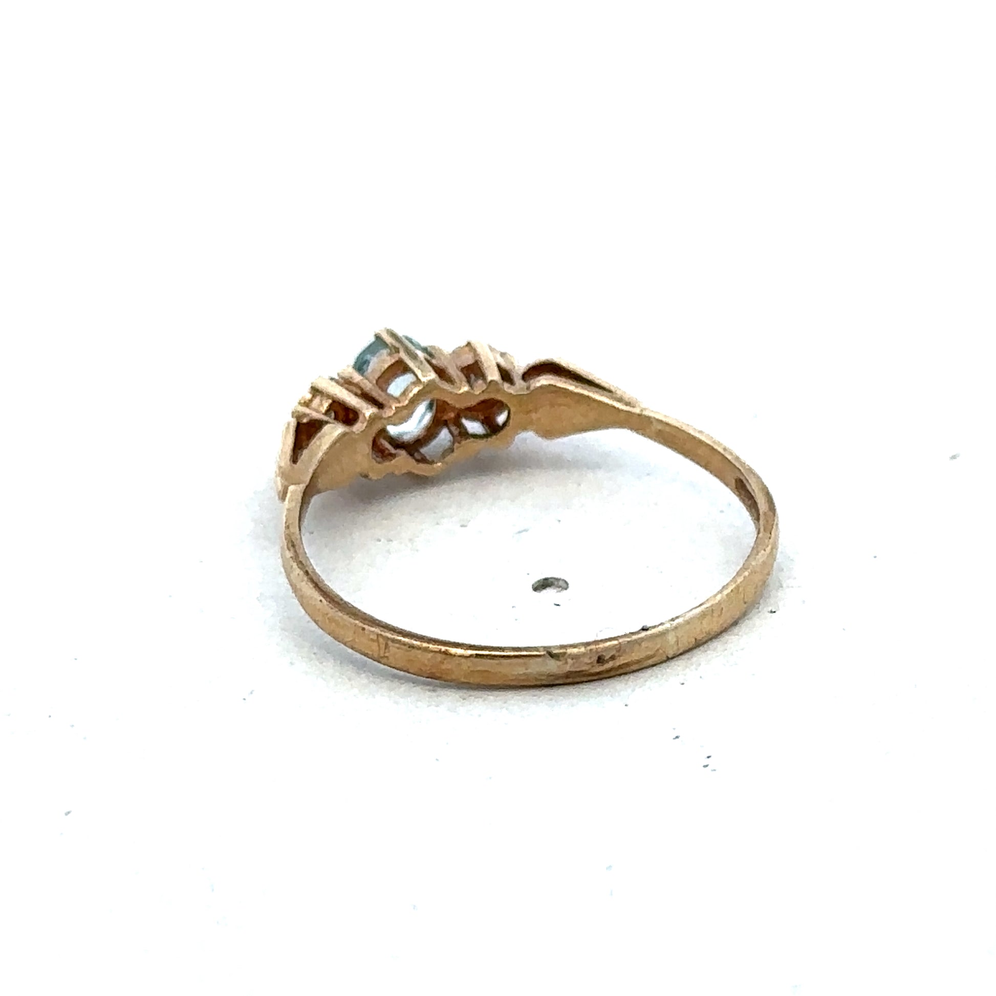 9ct yellow gold diamond ring by Reeves and Sons, featuring a sparkling diamond set in a elegant band.